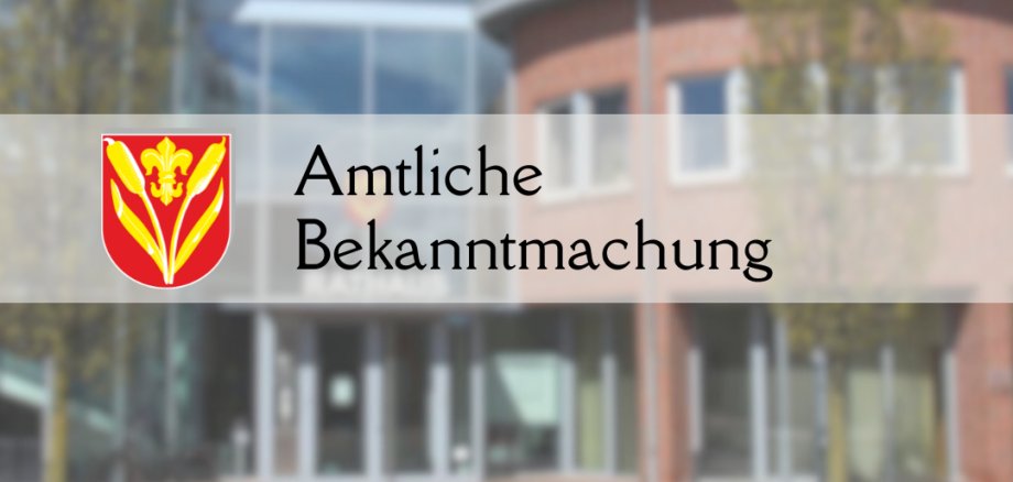 Das Rathaus der Gemeinde Wietmarschen befindet sich verblasst im Hintergrund. Im Vordergrund ist das Wappen sowie die Aufschrift "Amtliche Bekanntmachung" zu sehen.